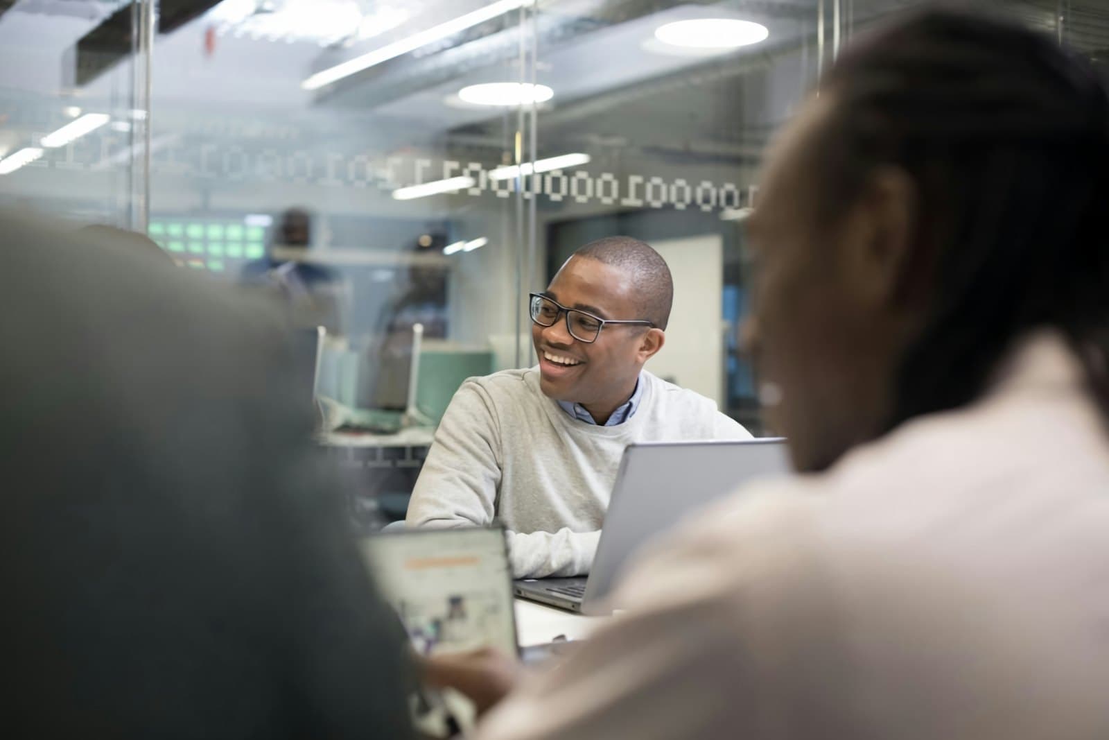 Team discussing a business system in the office