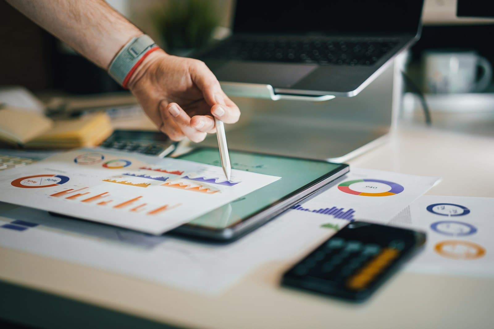 Marketing report and charts on a tablet