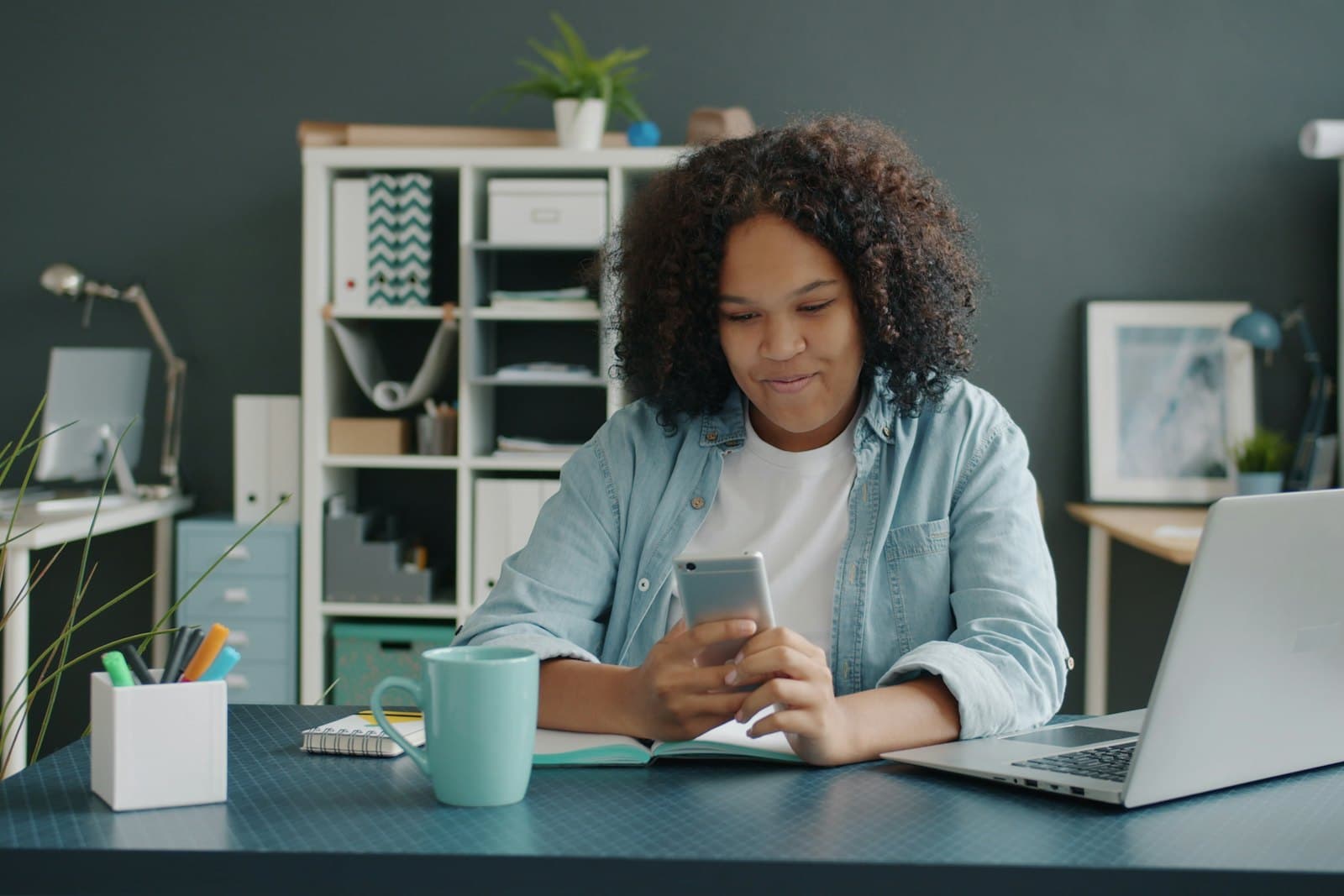 A developer testing an app on her phone