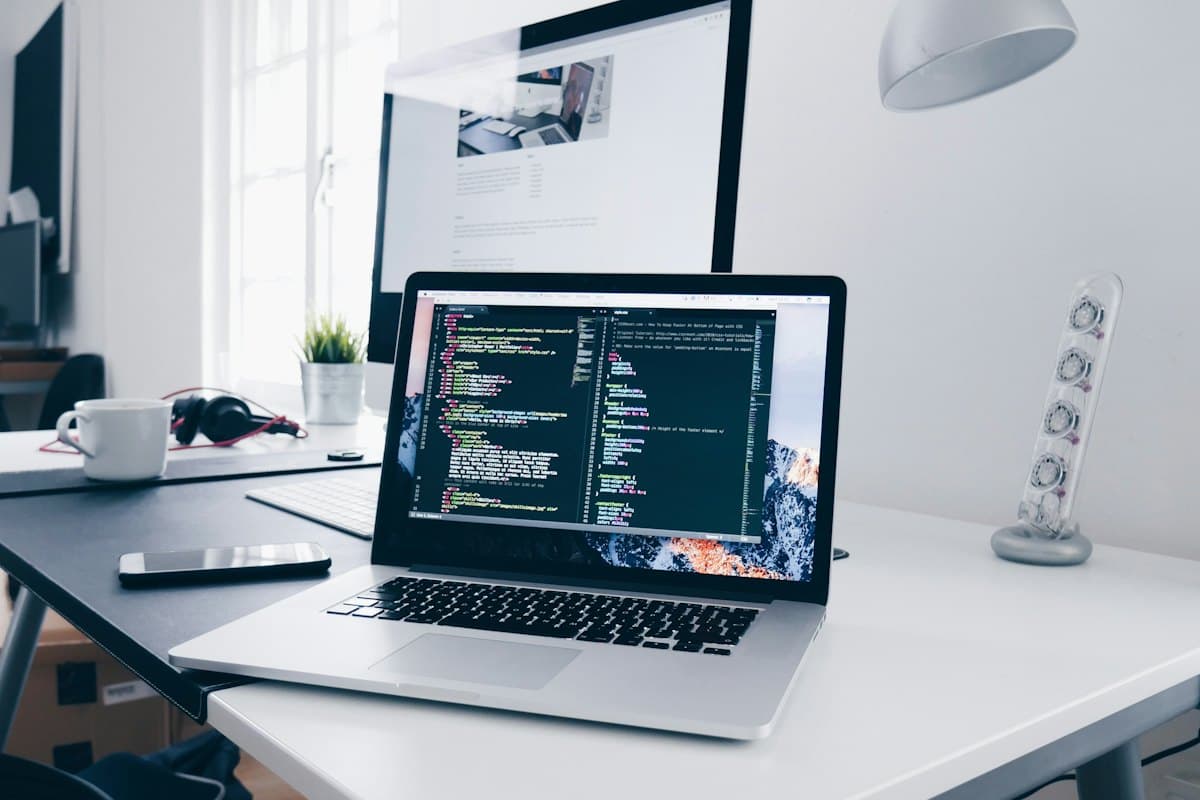 Code open on a laptop on a desk