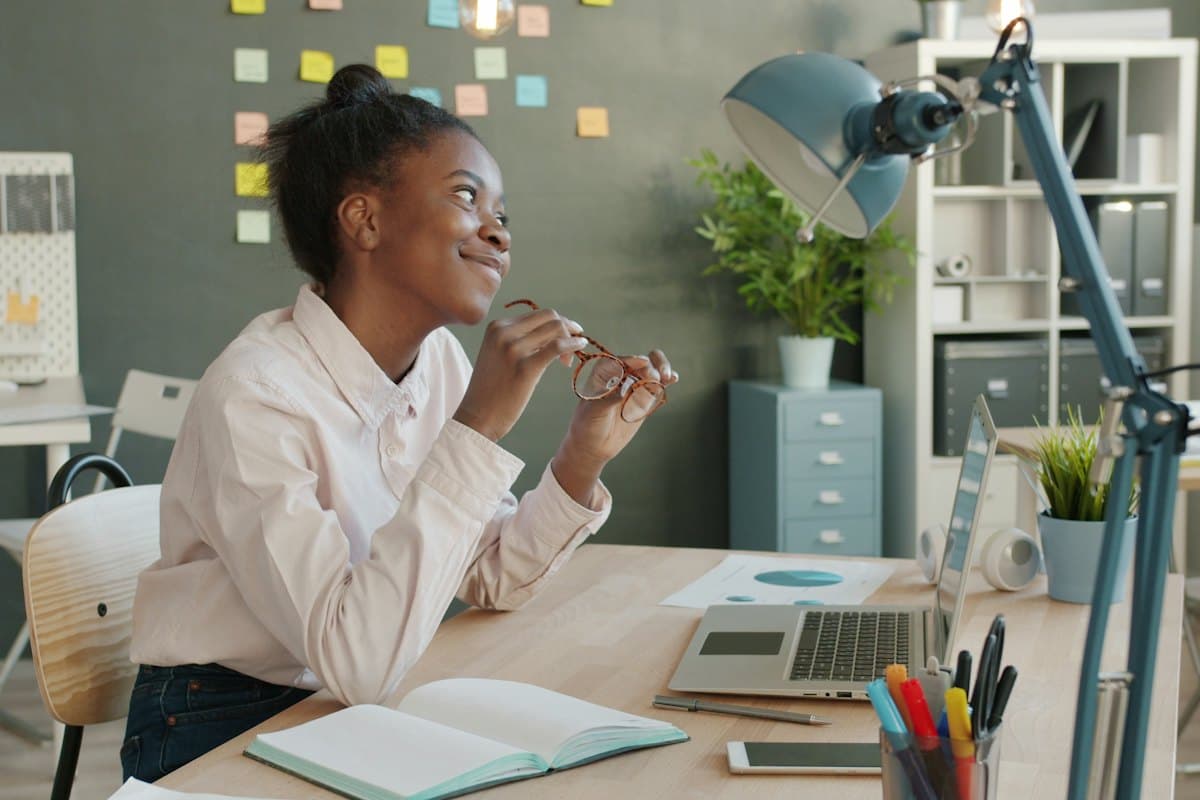 A marketer planning content at her desk