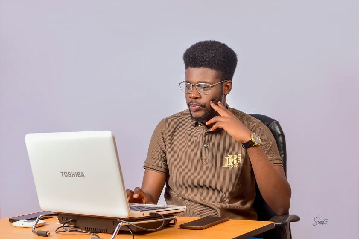 IT specialist configuring a laptop